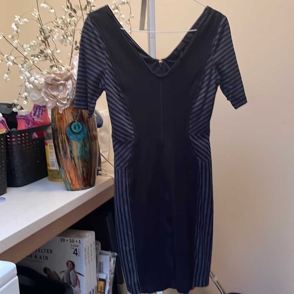 Women’s black and gray fitted black BCBG. maxzaria v neck zipper down the back.